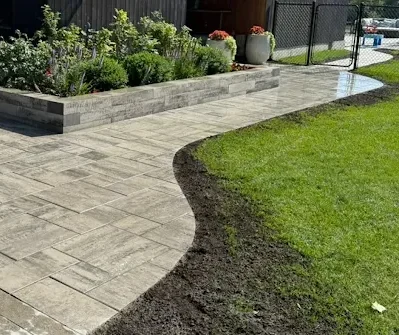 Stone patio installation job Landscaping services