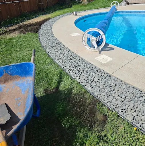 Granite bed installation beside swimming pool