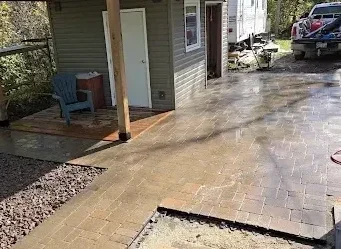 Stone backyard patio installed