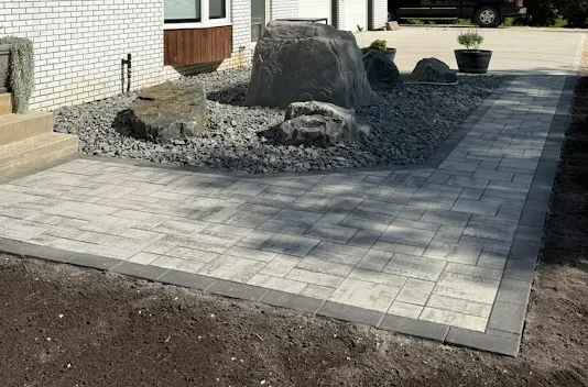 stone laying walkway for residential home